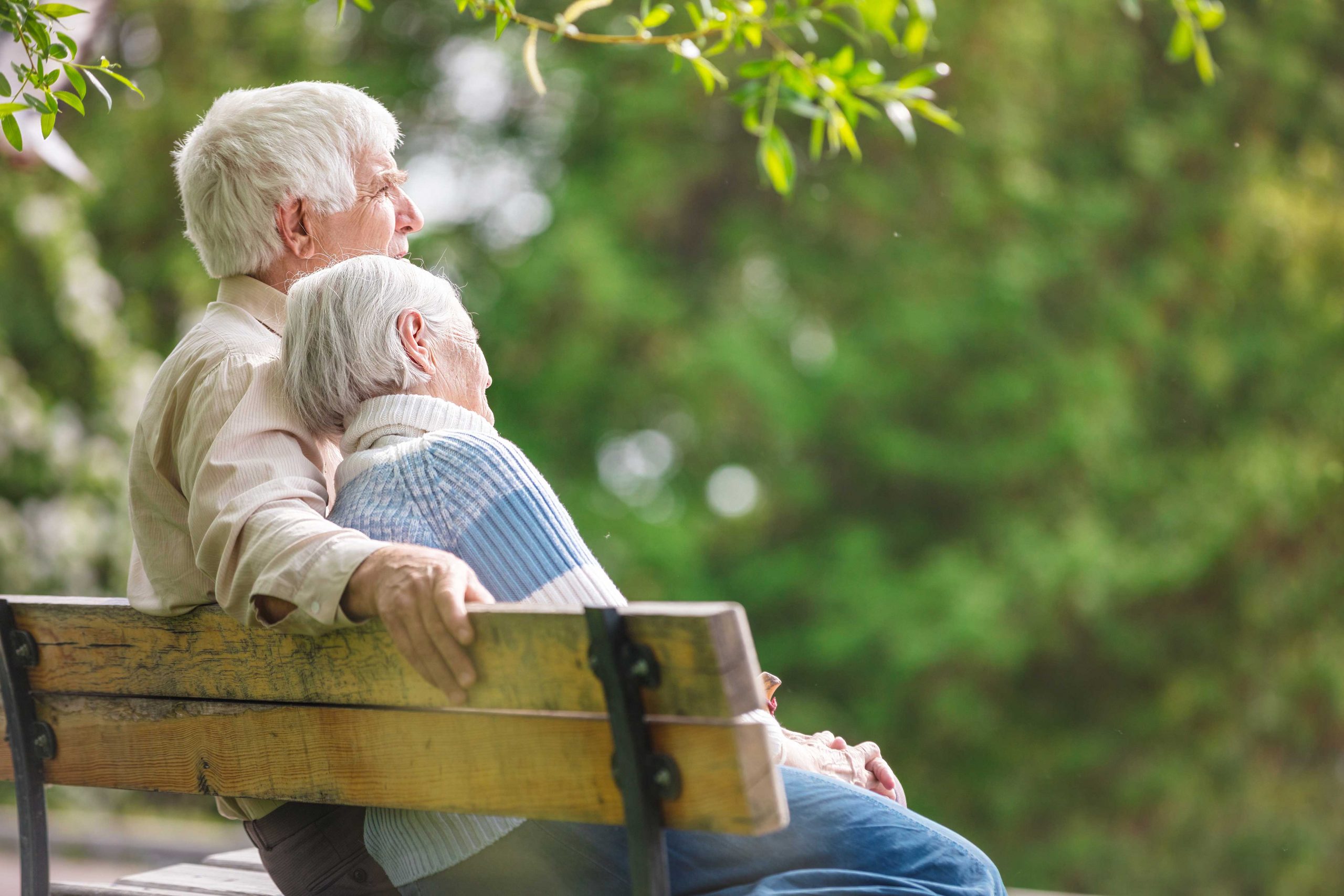 Senior Couple on Bench Outside