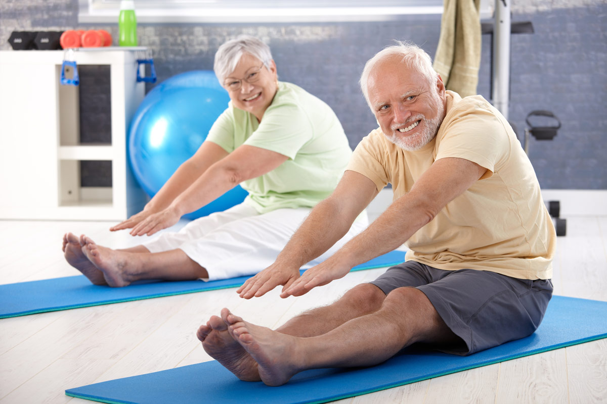 Pacific Carlton retirement community seniors performing stretches and exercises