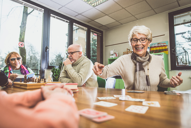 Seniors playing games at independent or assisted living community in South Surrey White Rock